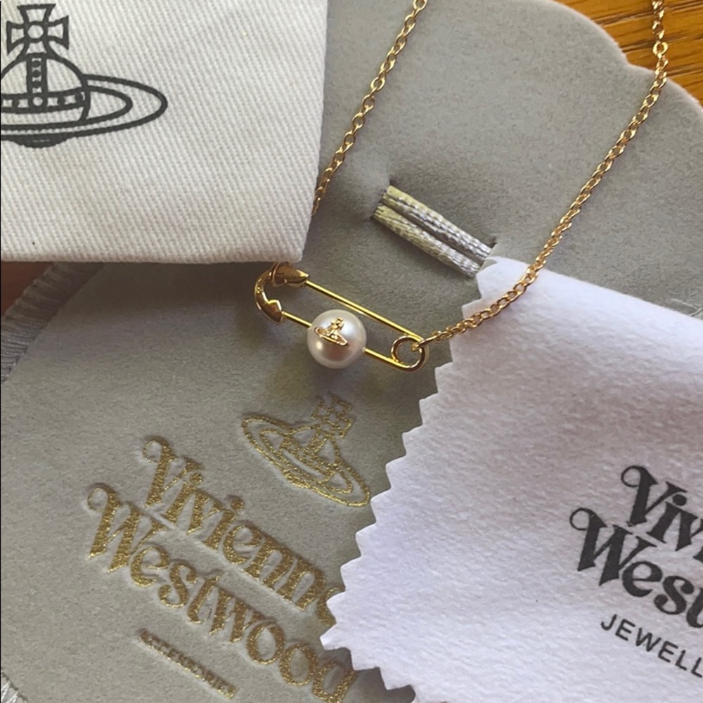 Vivienne Westwood gold pearl safety pin necklace